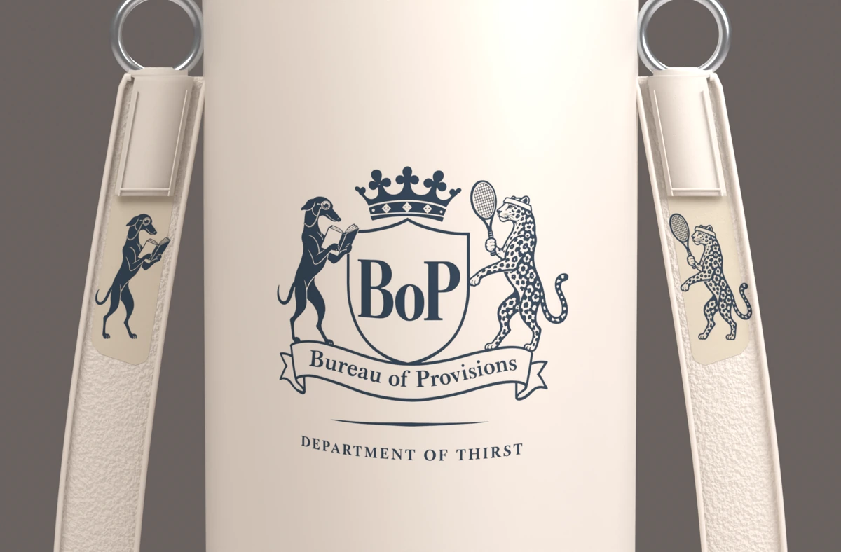 Actual Blender design close-up showing the new full crest, reading greyhound on the left strap and tennis leopard on the right